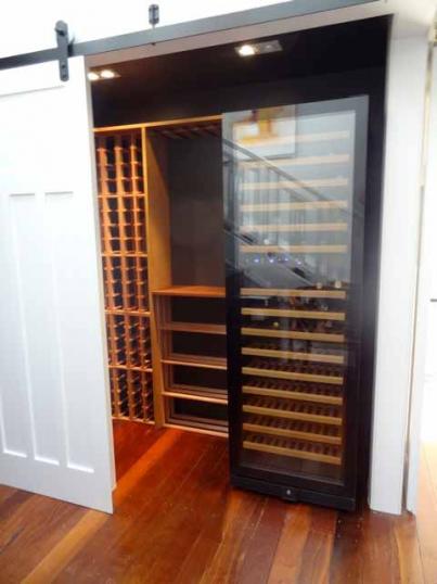 John Stephens Wine Cellar With Sliding Doors