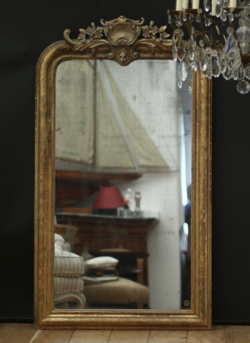 Mirror with Incised Frame and Shell Crest