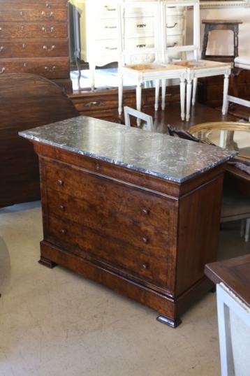 Brown walnut commode with marble top