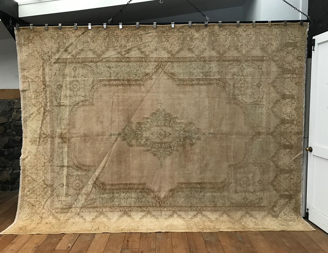 Distressed Persian Rug