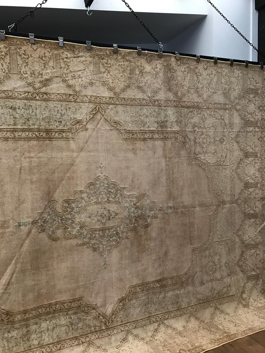 Distressed Persian Rug