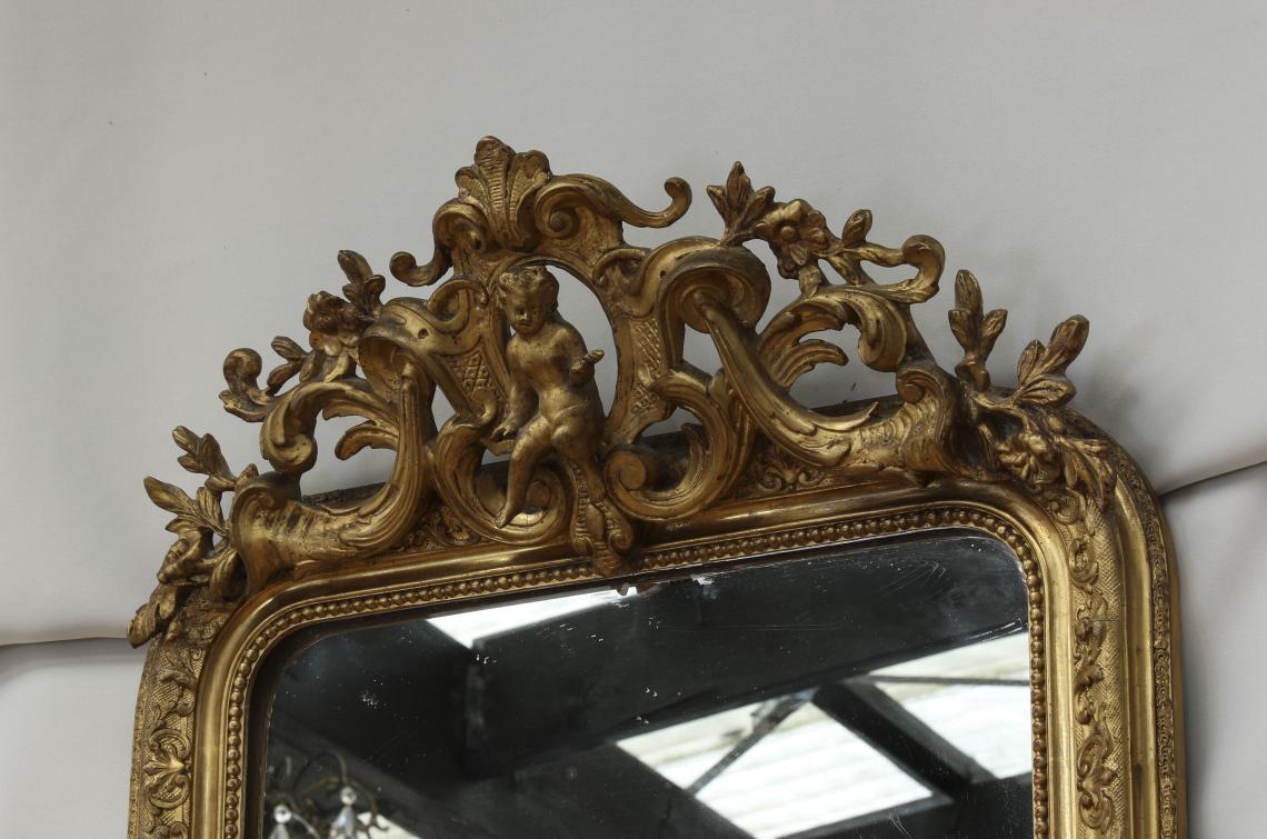 Tall Crested Gilt Mirror