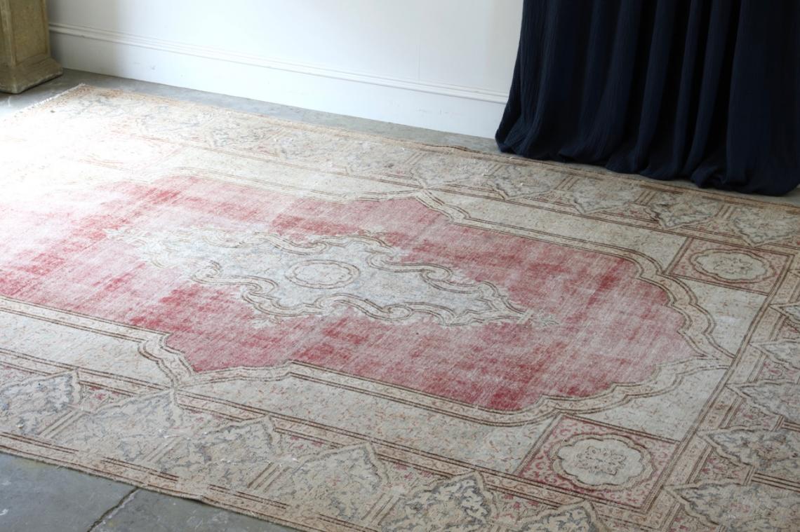 Distressed Persian Rug