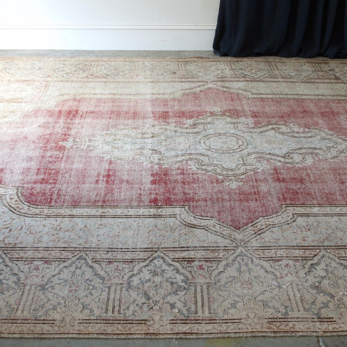 Distressed Persian Rug