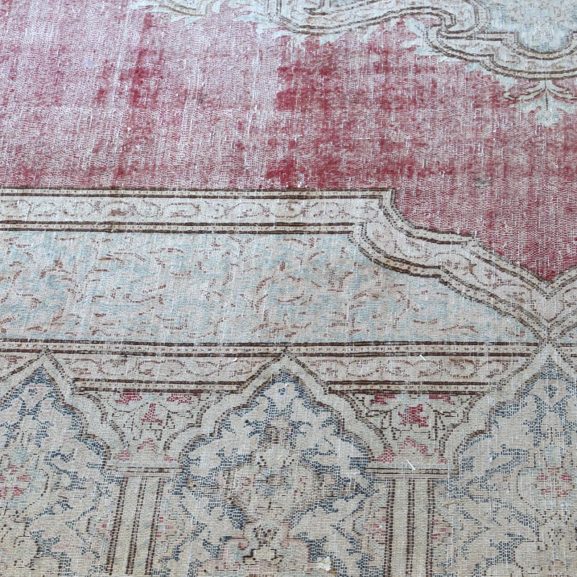 Distressed Persian Rug