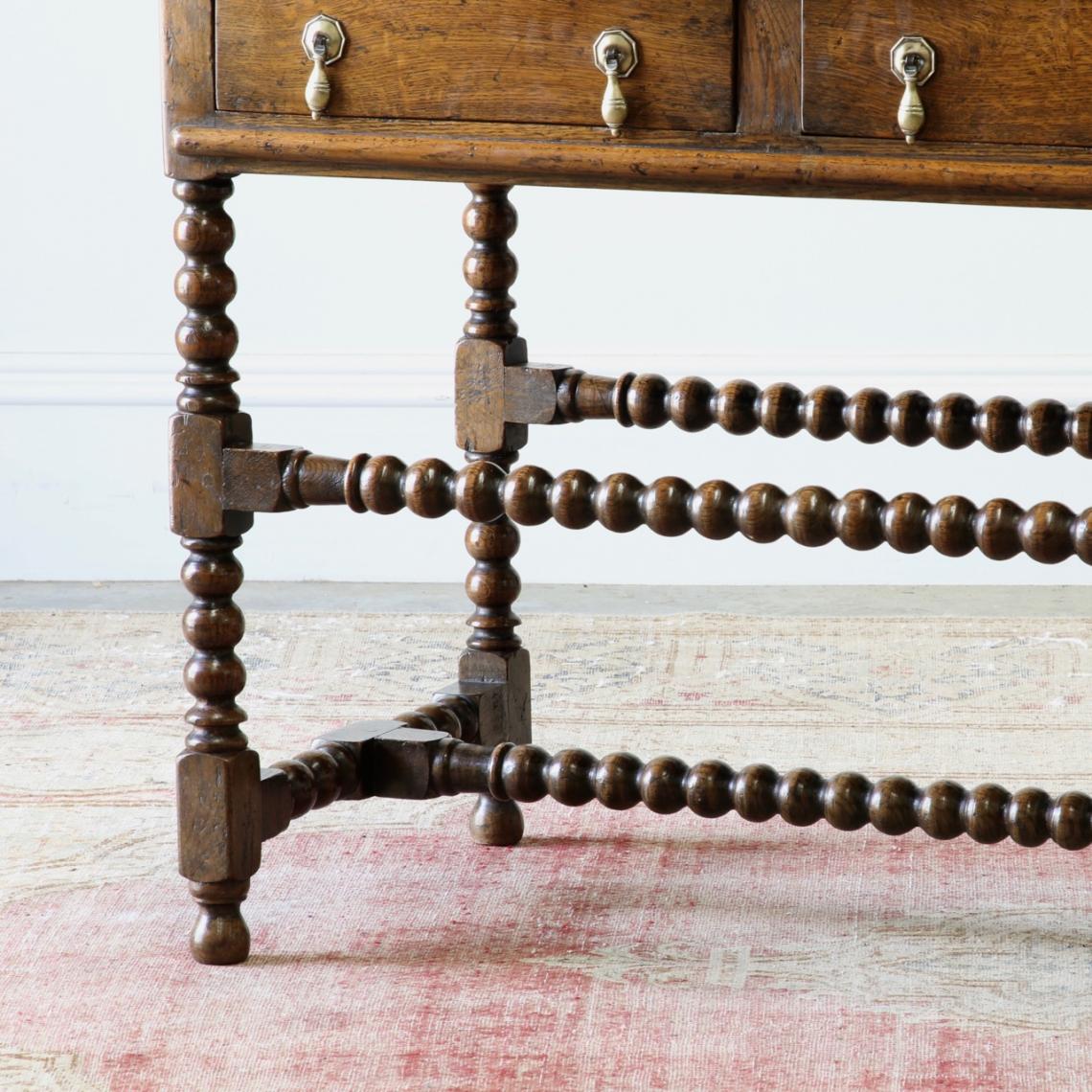 A Two Drawer Jacobean Oak Side Table