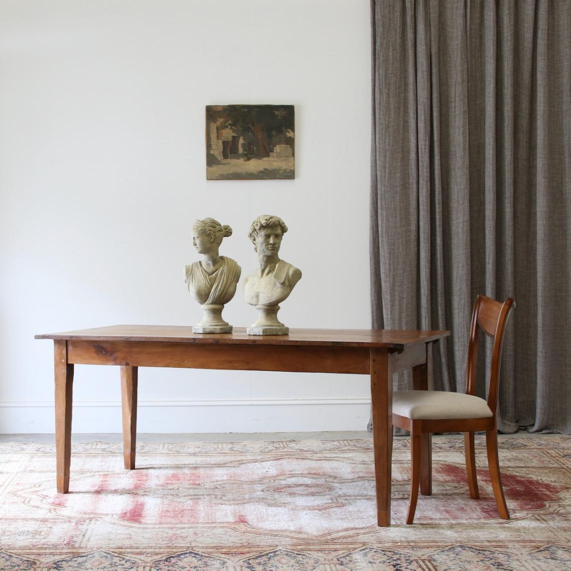 A Small French Provincial Cherrywood Dining Table