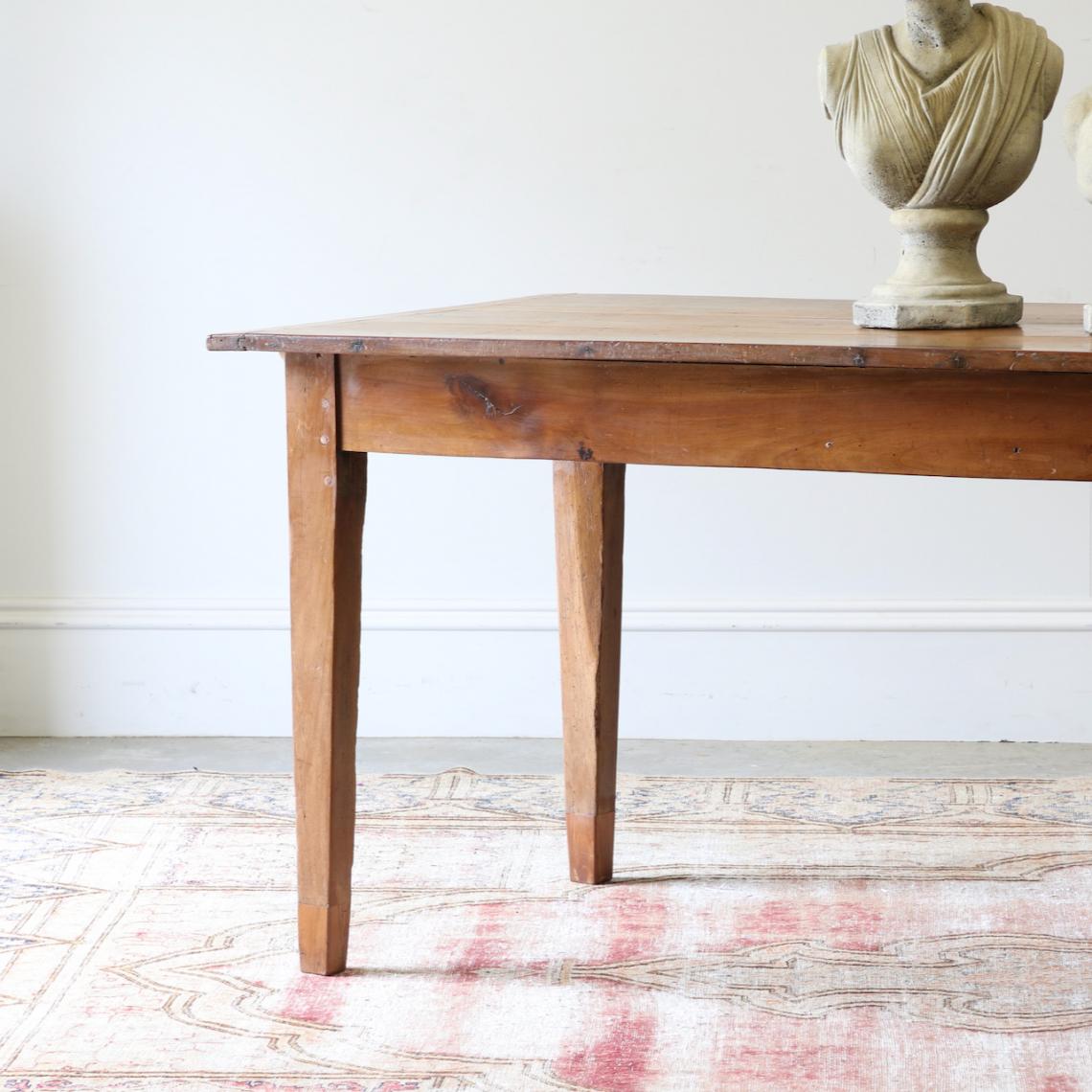 A Small French Provincial Cherrywood Dining Table