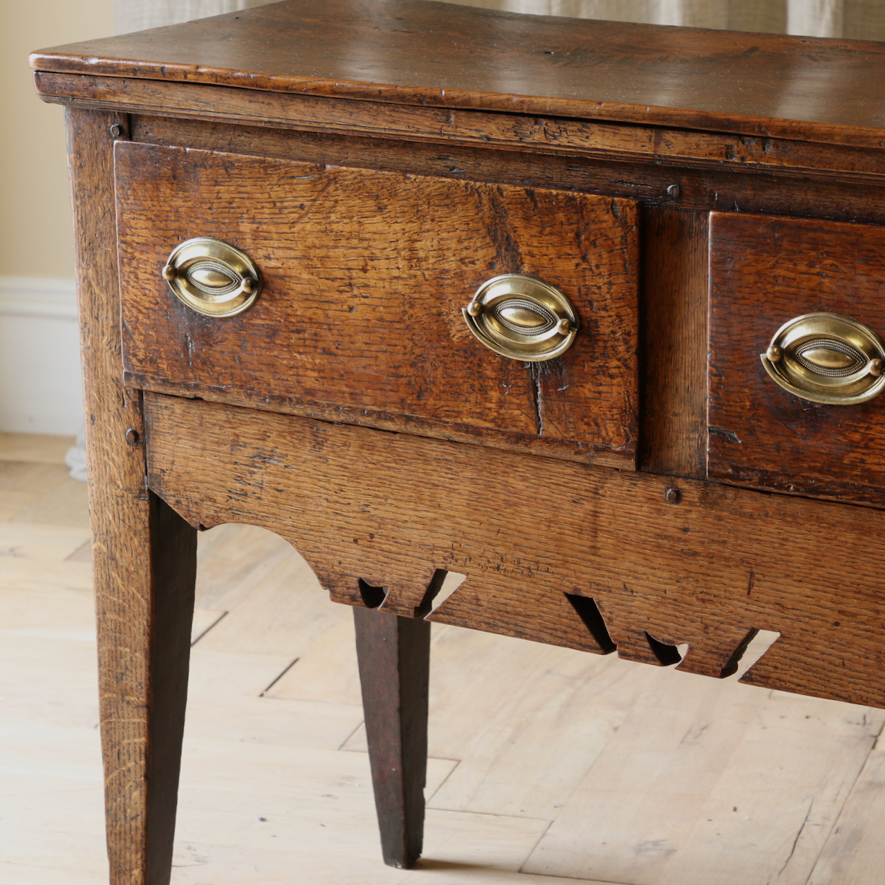 A Three Drawer English Oak Side Table