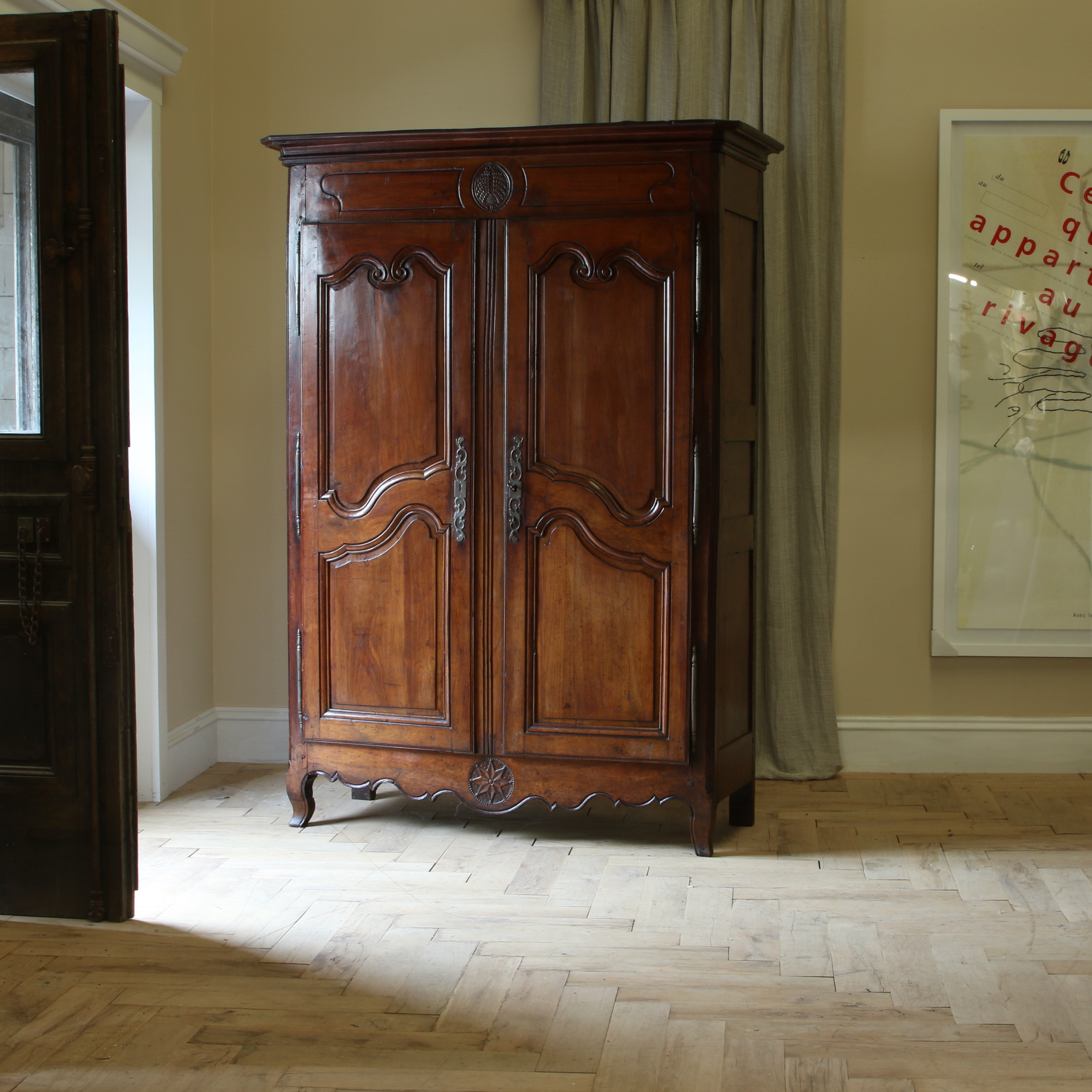 An 18th Century French Cherrywood Armoire