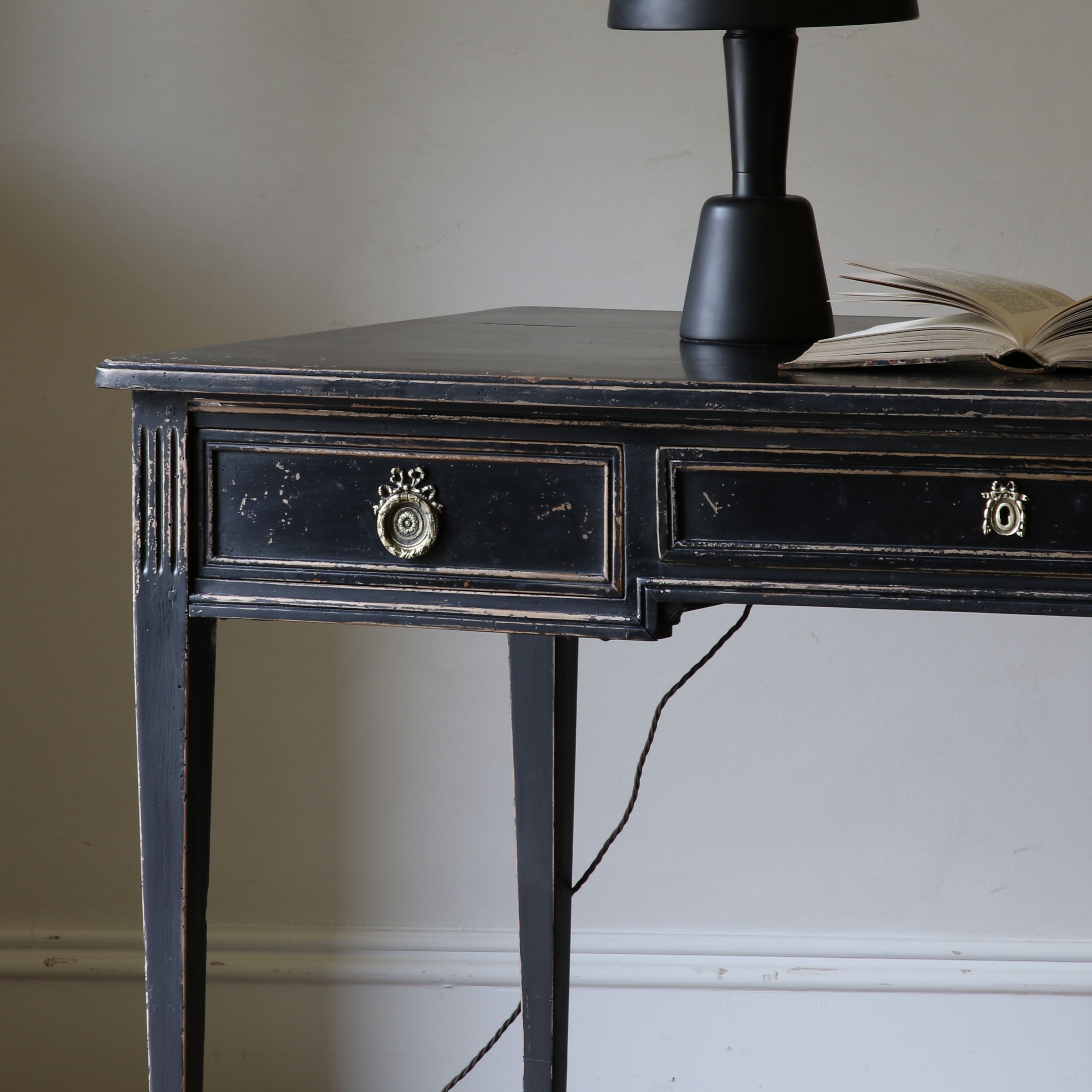 An Ebonised Bureau Plat