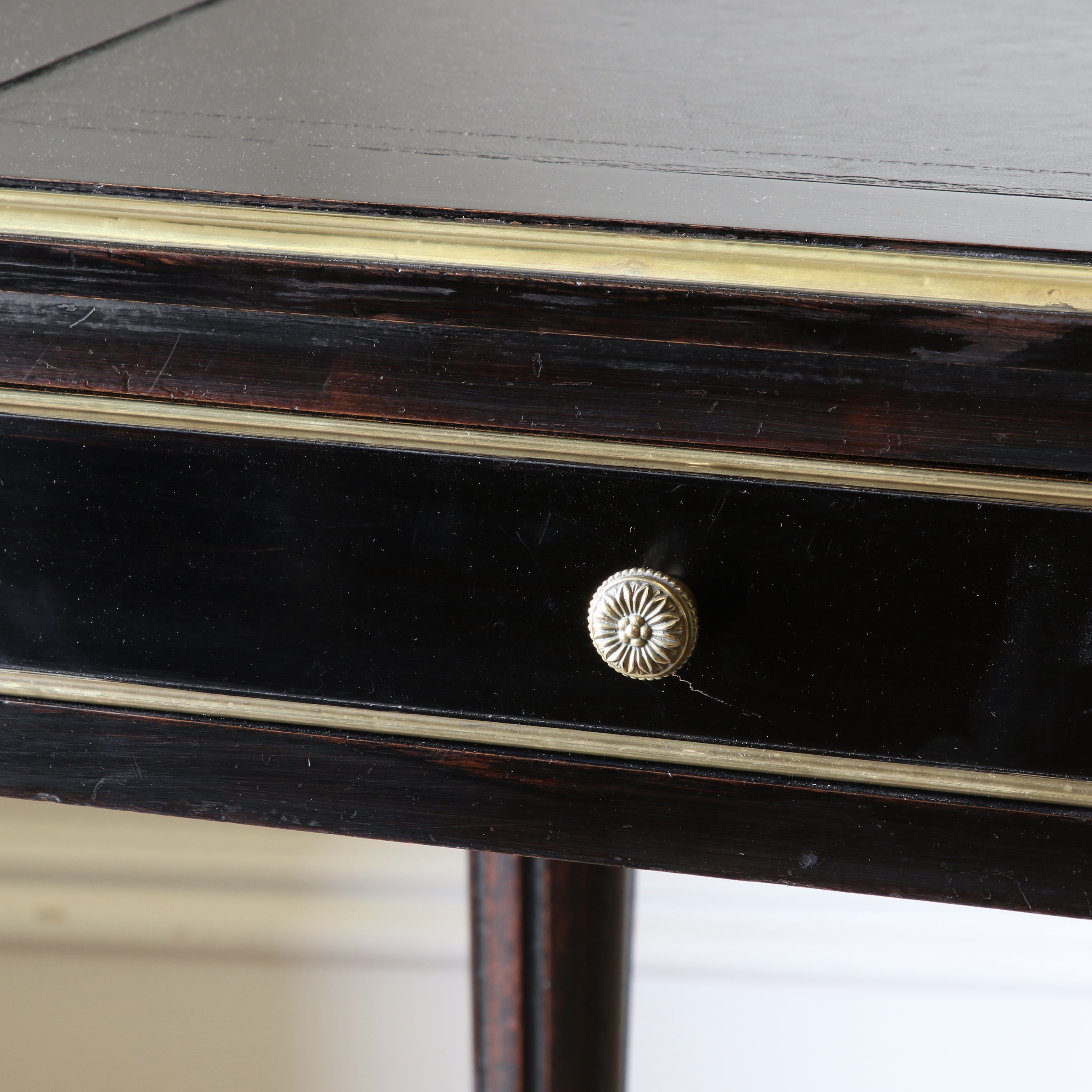 An Ebonised Bureau Plat