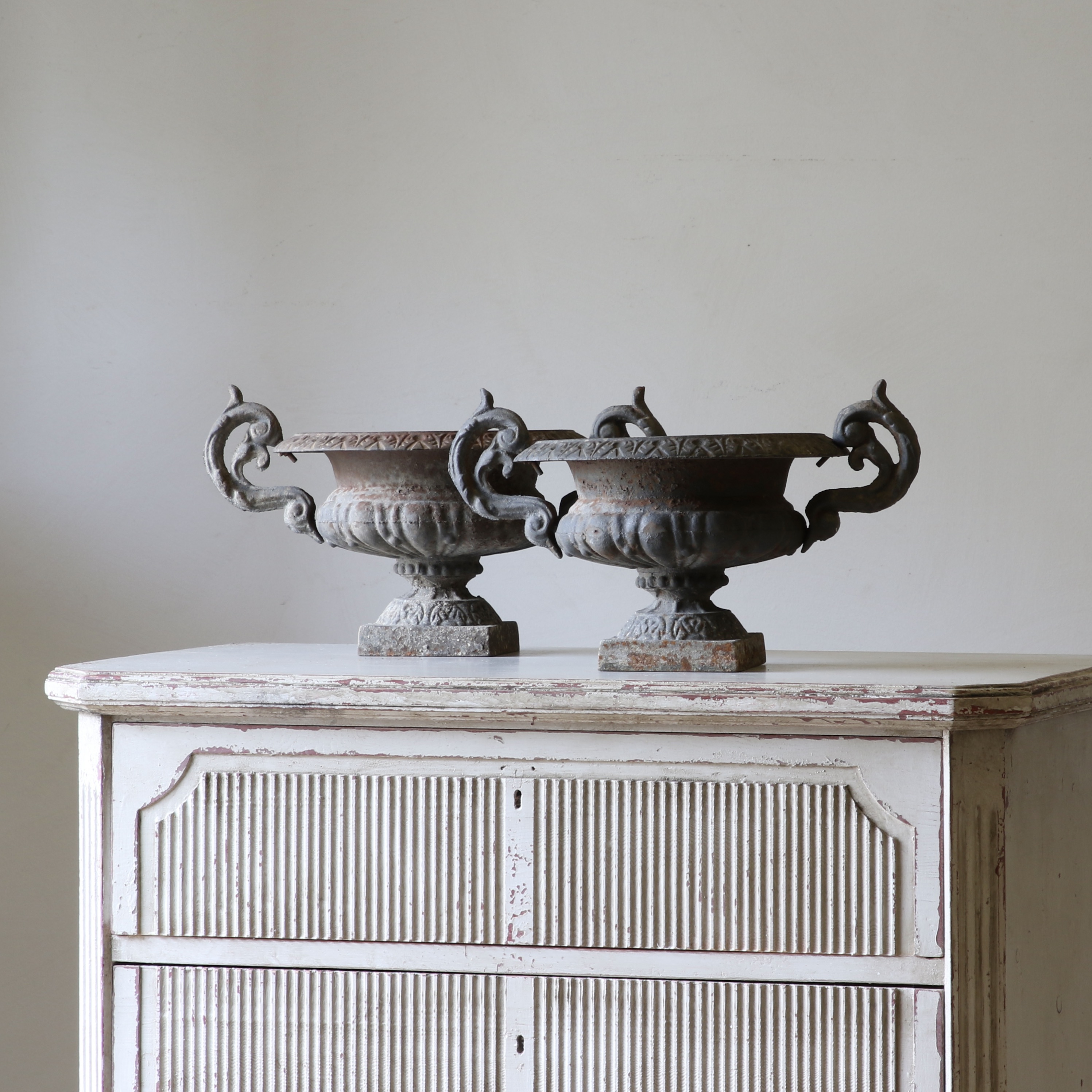 Pair of Cast Iron Urns