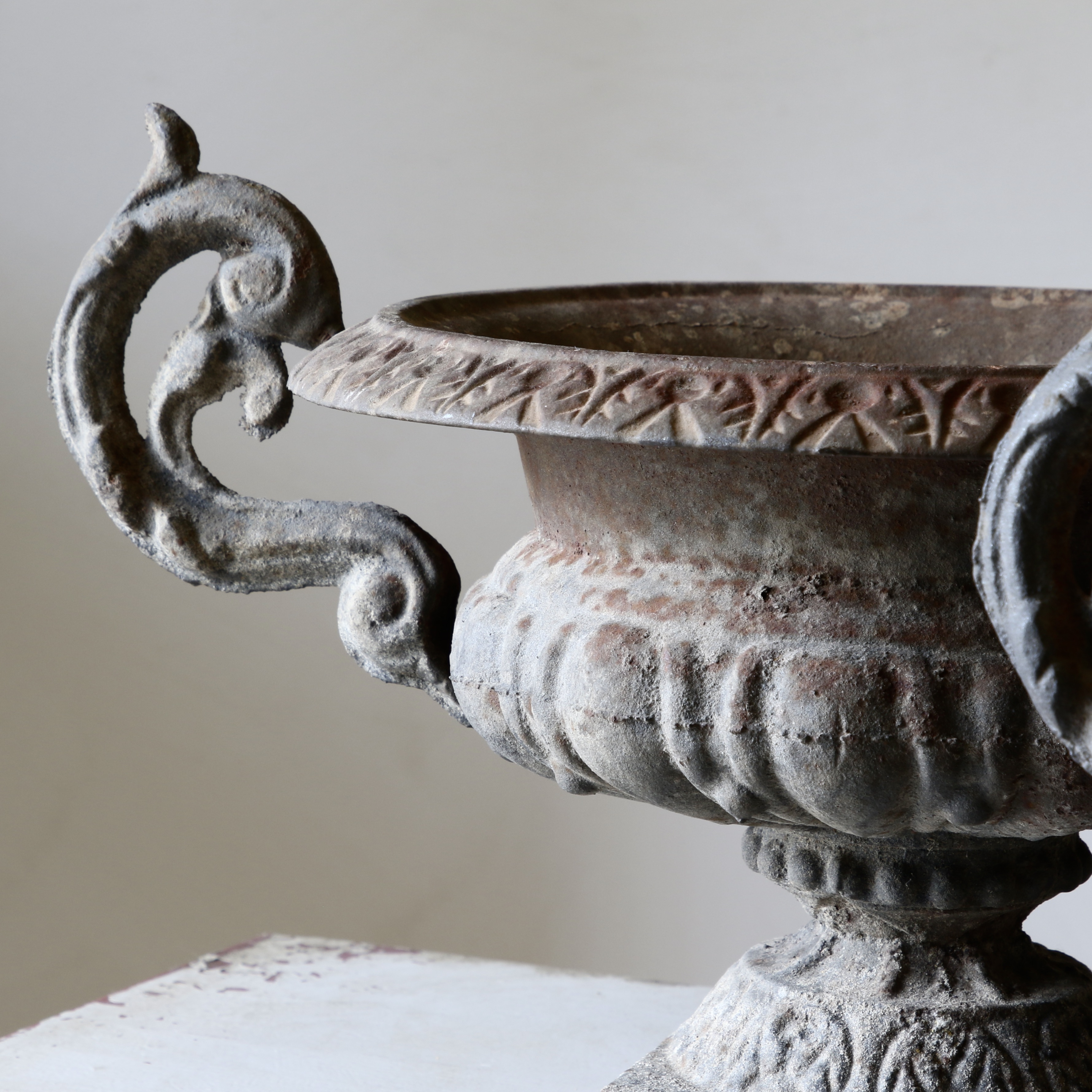 Pair of Cast Iron Urns