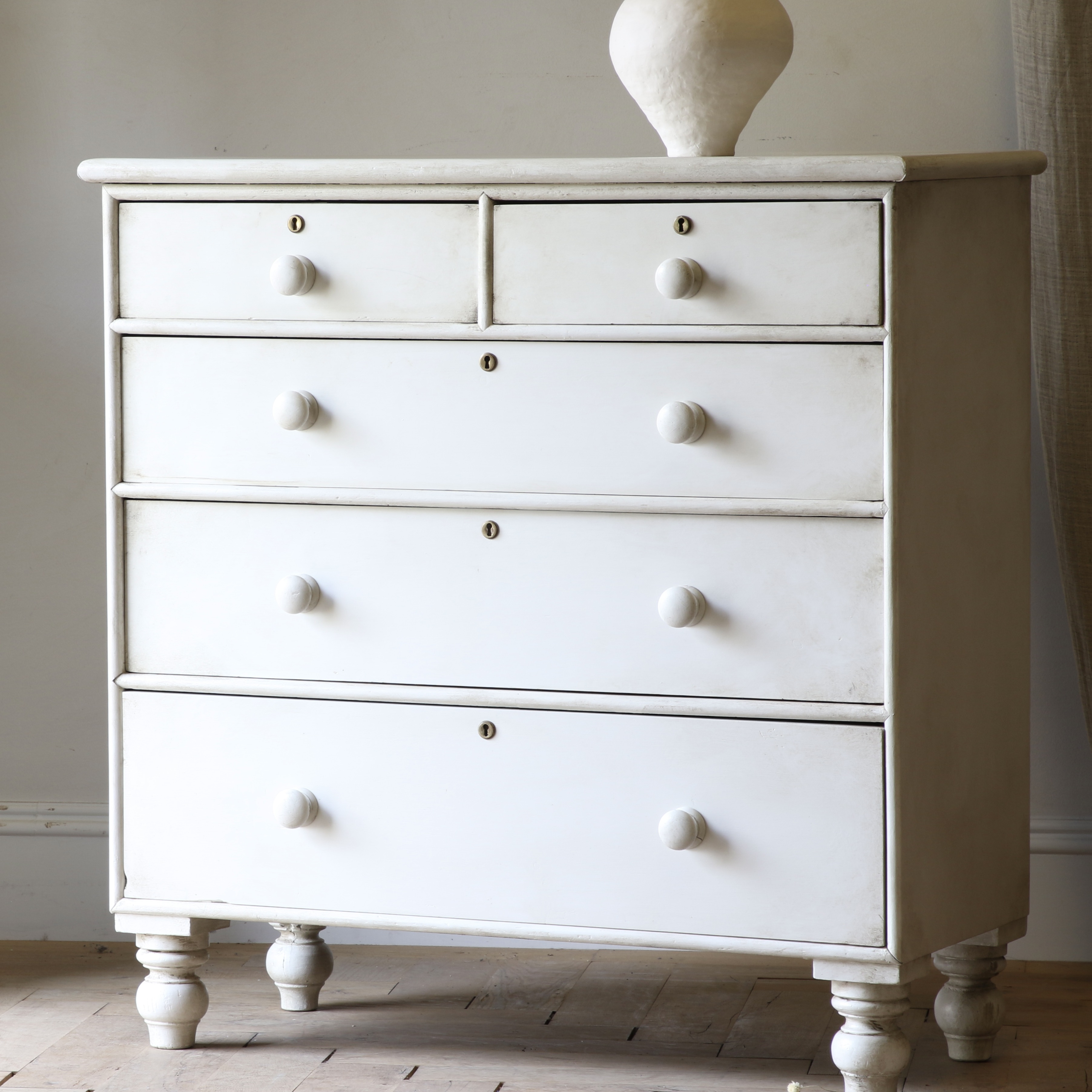 An English Painted Chest of Drawers