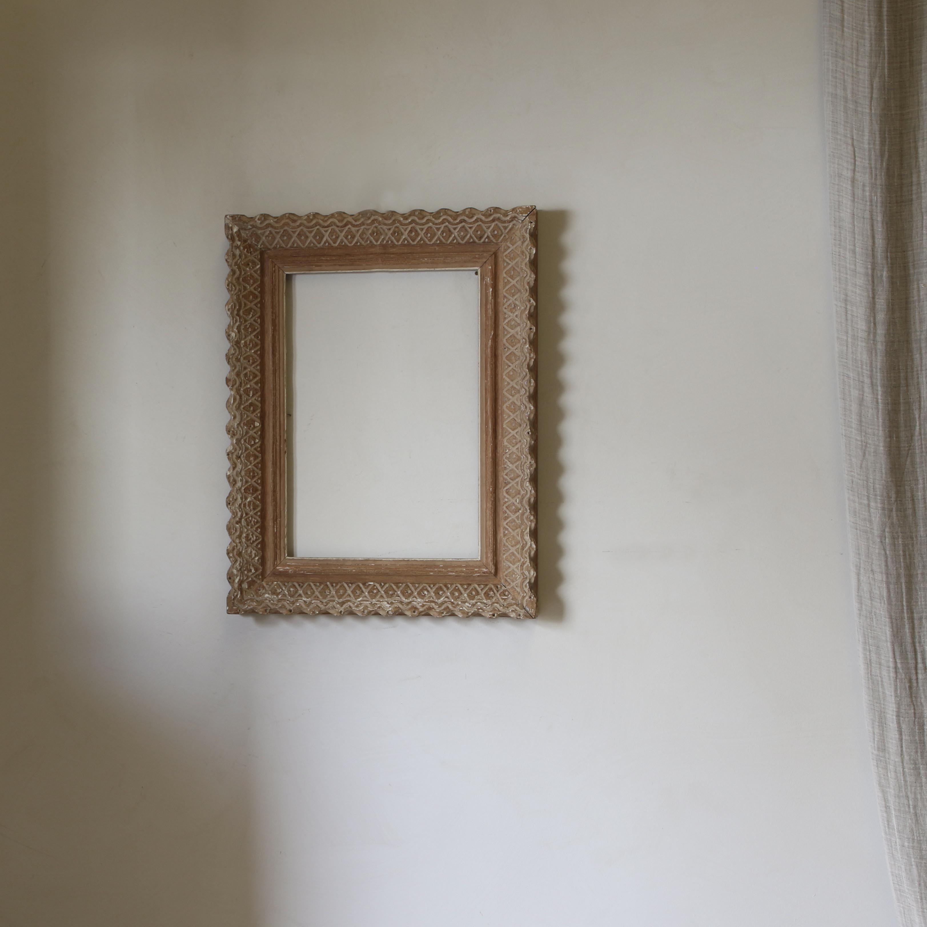 E. Bouche Carved Wooden Frame