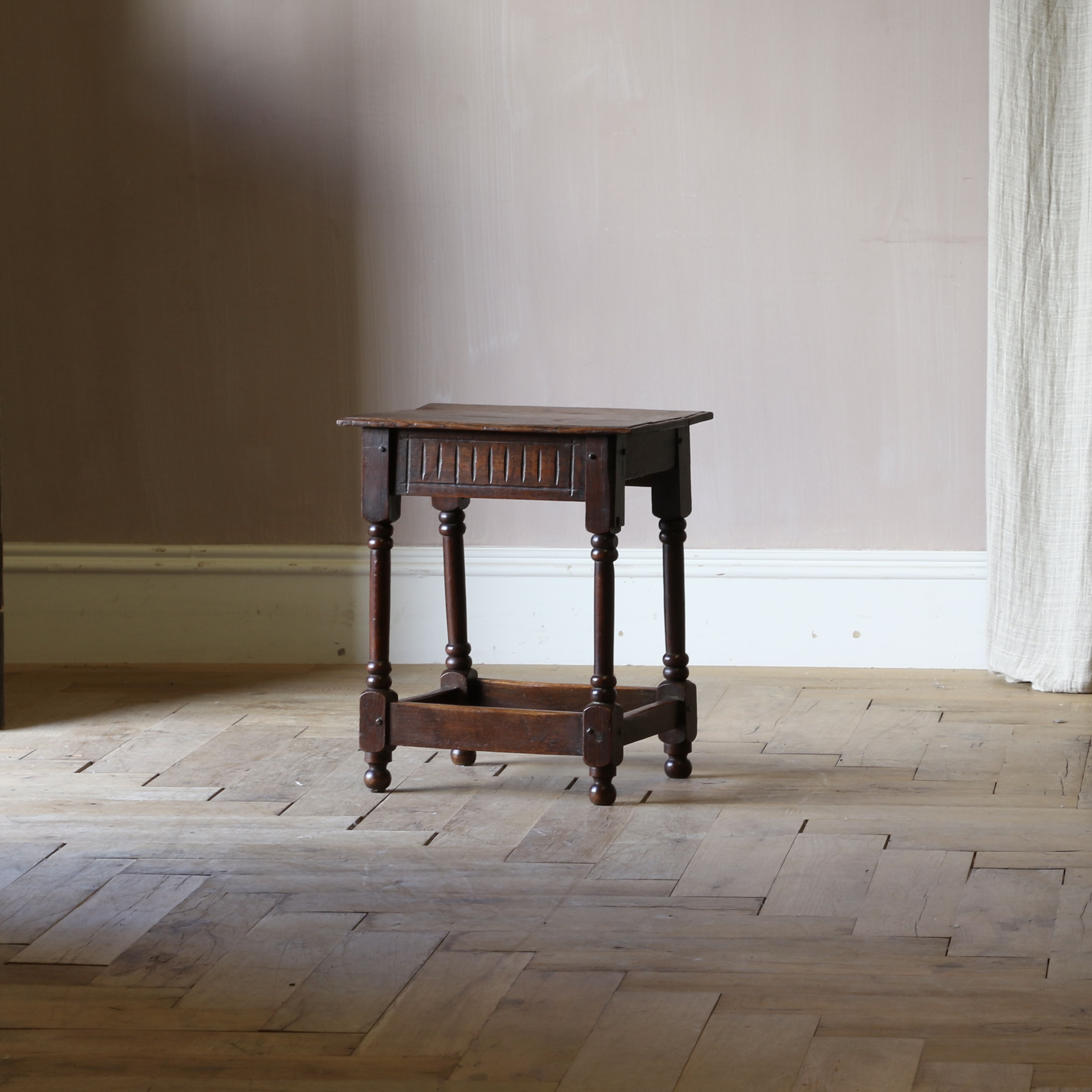 A Jacobean Style Oak Stool